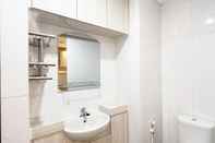 In-room Bathroom Homey and Good Deal 1BR Tamansari Skylounge Makassar Apartment By Travelio