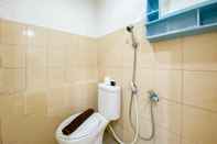 In-room Bathroom Comfort and Homey 2BR Green Pramuka City Apartment By Travelio