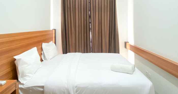 Bedroom Modern and Homey 1BR at Vasanta Innopark Apartment By Travelio