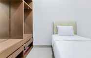 Kamar Tidur 2 Homey and Good 2BR at Parkland Avenue Apartment By Travelio