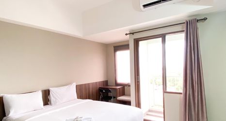 Bedroom 2 Good Choice and Warm Studio LRT City Jatibening Apartment By Travelio