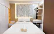 Bilik Tidur 2 Good Choice and Comfy Studio at Delft Ciputra Makassar Apartment By Travelio