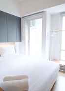 BEDROOM Homey and Enjoy Studio at Orchard Supermall Mansion Apartment By Travelio