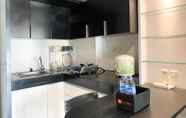 Ruang Umum 6 Homey and Warm Living 2BR at Springlake Summarecon Bekasi Apartment By Travelio