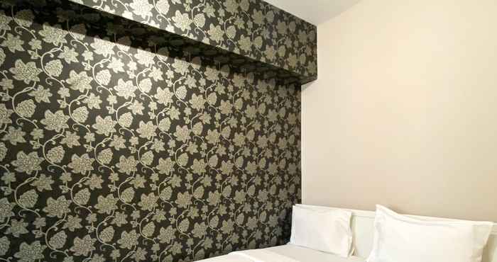 Bedroom Homey and Warm Living 2BR at Springlake Summarecon Bekasi Apartment By Travelio