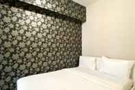 Bedroom Homey and Warm Living 2BR at Springlake Summarecon Bekasi Apartment By Travelio