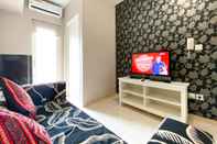 Common Space Homey and Warm Living 2BR at Springlake Summarecon Bekasi Apartment By Travelio