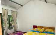 Bedroom 3 Bukit Senyum Cottage & Villa