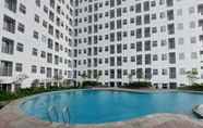 Swimming Pool 5 Modern & Cozy Design Studio Serpong Garden Apartment By Travelio