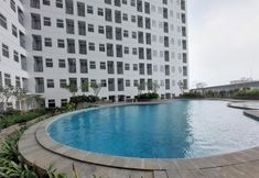 Kolam Renang 4 Modern & Cozy Design Studio Serpong Garden Apartment By Travelio