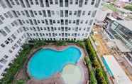 Swimming Pool 6 Modern & Cozy Design Studio Serpong Garden Apartment By Travelio