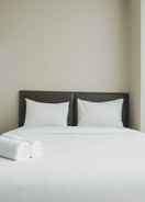 BEDROOM Cozy and Chic Studio Apartment at Ciputra International By Travelio