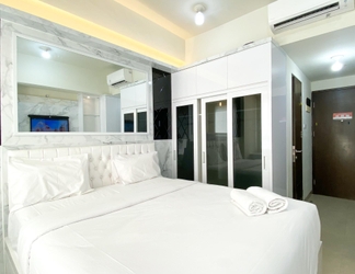 Kamar Tidur 2 Cozy and Restful Studio Apartment at Mustika Golf Residence By Travelio