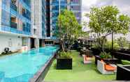 Swimming Pool 7 Nice and Homey Studio Tamansari The Hive Apartment By Travelio