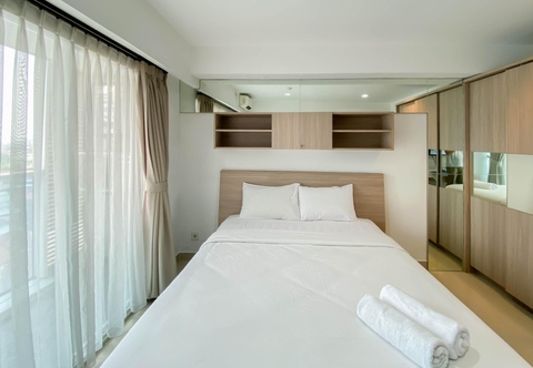 Kamar Tidur Nice and Homey Studio Tamansari The Hive Apartment By Travelio