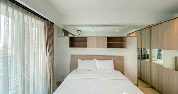 Bedroom Nice and Homey Studio Tamansari The Hive Apartment By Travelio