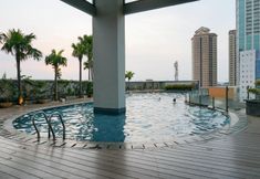 Swimming Pool 4 Cozy and Simply Look 1BR GP Plaza Apartment By Travelio