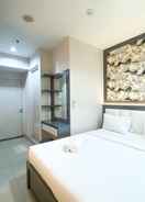 BEDROOM Comfy and Good Studio at Grand Kamala Lagoon Apartment By Travelio