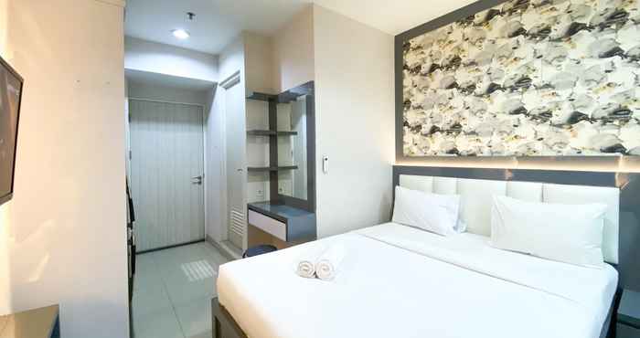 Bedroom Comfy and Good Studio at Grand Kamala Lagoon Apartment By Travelio