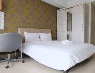 Bedroom 2 Strategic and Modern Designed Studio Room at Beverly Dago Apartment By Travelio
