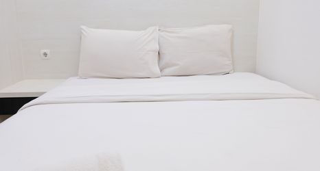 Bedroom 2 Cozy and Homey 2BR Apartment at Parahyangan Residence By Travelio