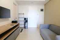 Common Space Comfy and Homey 2BR Apartment at Parahyangan Residence By Travelio