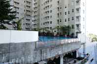 Exterior Comfy and Homey 2BR Apartment at Parahyangan Residence By Travelio