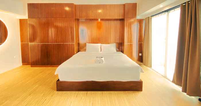 ห้องนอน Studio Modern Room at Tamansari La Grande By Travelio