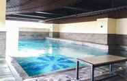 Swimming Pool 5 Studio Modern Room at Tamansari La Grande By Travelio