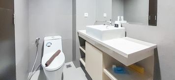 In-room Bathroom 5 Comfortable and Best Deal Studio at Patraland Amarta Apartment By Travelio