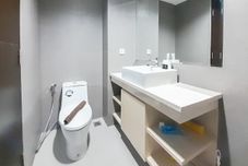 In-room Bathroom Comfortable and Best Deal Studio at Patraland Amarta Apartment By Travelio