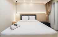 Kamar Tidur 6 Comfortable and Modern Look Studio at Patraland Amarta Apartment By Travelio