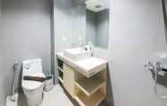 In-room Bathroom 4 Comfortable and Modern Look Studio at Patraland Amarta Apartment By Travelio