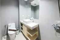 In-room Bathroom Comfortable and Modern Look Studio at Patraland Amarta Apartment By Travelio