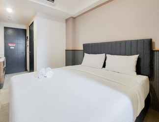 Bedroom 2 Cozy Stay and Enjoy Studio at Collins Boulevard Apartment By Travelio