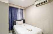 Bedroom 2 Nice and Minimalist 2BR Apartment at Royal Makassar By Travelio