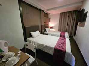 ห้องนอน 4 Warisan Hotel