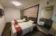 ห้องนอน 6 Warisan Hotel