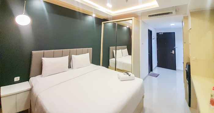 Bilik Tidur Cozy and Great Deal Studio Patraland Amarta Apartment By Travelio