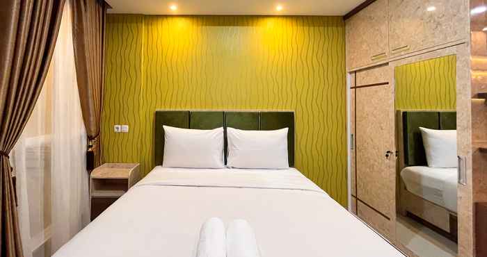 Bedroom Modern Studio Room at Tamansari Skylounge Makassar Apartment By Travelio