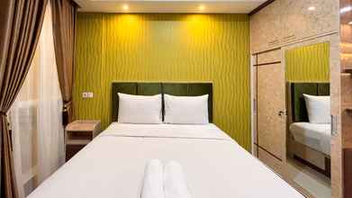 Bedroom Modern Studio Room at Tamansari Skylounge Makassar Apartment By Travelio