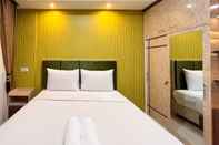 Bedroom Modern Studio Room at Tamansari Skylounge Makassar Apartment By Travelio