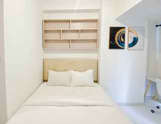 Kamar Tidur 2 Simply Look and Warm Studio Tokyo Riverside PIK 2 Apartment By Travelio