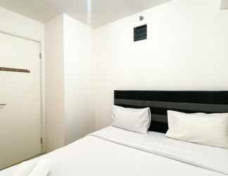 Kamar Tidur 2 Homey and Well Furnished 2BR Bassura City Apartment By Travelio