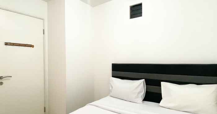 Kamar Tidur Homey and Well Furnished 2BR Bassura City Apartment By Travelio