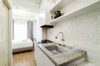 Common Space Cozy Style Studio Room Apartment at Grand Asia Afrika By Travelio