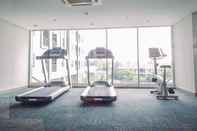 Fitness Center Homey and Wonderful 1BR Apartment Royal Olive Residence By Travelio