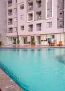 SWIMMING_POOL Homey and Wonderful 1BR Apartment Royal Olive Residence By Travelio