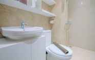 In-room Bathroom 5 Clean and Cozy 2BR at Transpark Cibubur Apartment By Travelio