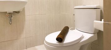 In-room Bathroom 6 Serene Designed 2BR Apartment at Meikarta By Travelio